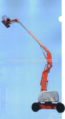 Engine powered cross contry type articulating boom lifts
