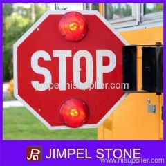 Safety Stop Sign fixed on School Bus