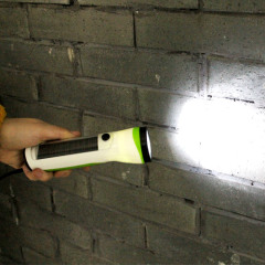 Solar flashlight with radio