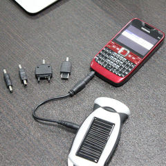 Solar mobile charger with flashlight