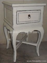 antique showroom bedside table