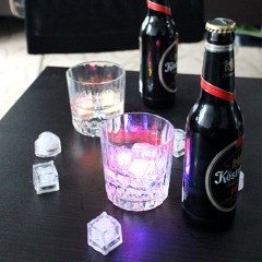 Flashing ice cube for LED candle