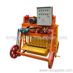 Egg laying concrete block machine