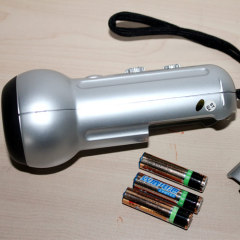 Flashlight with radio & alarm