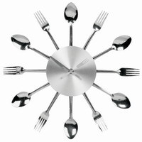 silver dinnerware encircling wall clock