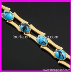 golden turquoise charm bracelet