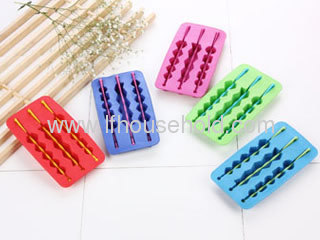 novelty ice cube tray with three stick ice lolly