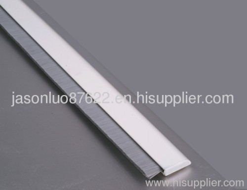 Aluminium spring loaded brush door seal