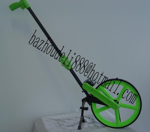 Distance measuring wheel / surveying instrument