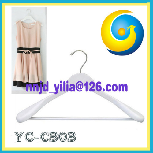 white wooden clothes hanger