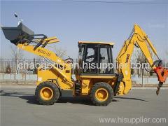 BACKHOE LOADER WITH CUMMINS ENGINE AND HYDRAULIC HAMMER