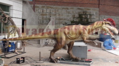 Simulated dinosaur for outdoor playground