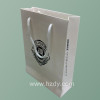 White paper bag with white cotton rope
