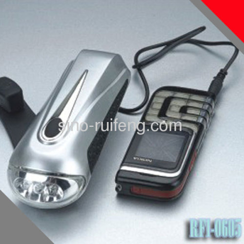 Dynamo led flashlight with phone charger