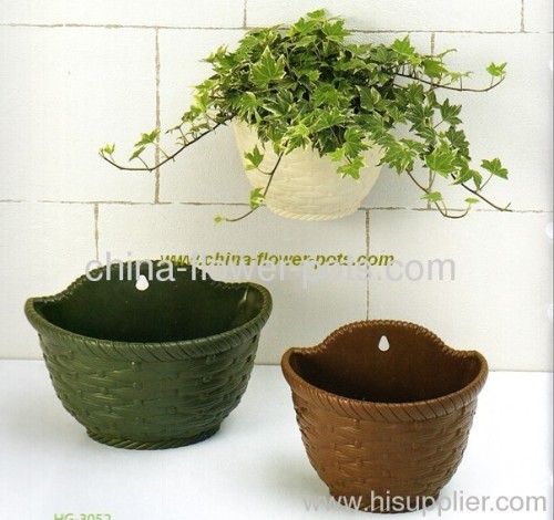 self-watering flower pot