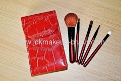 red travel brush set with case