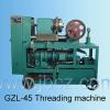 Threading machine