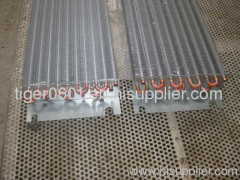 Copper tube and al fin evaporator for agricultural vehicle