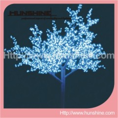 christmas outdoor decorative lighted trees and flowers