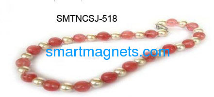 white pearl magnetic necklace matches the plastic beads