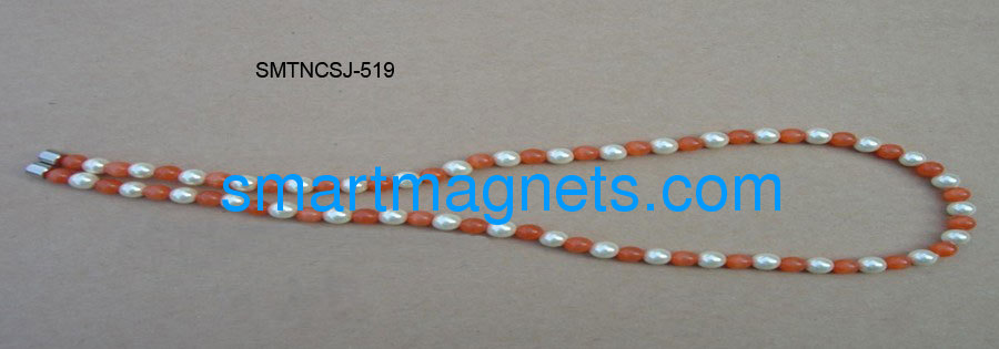 white pearl magnetic necklace matches the plastic beads