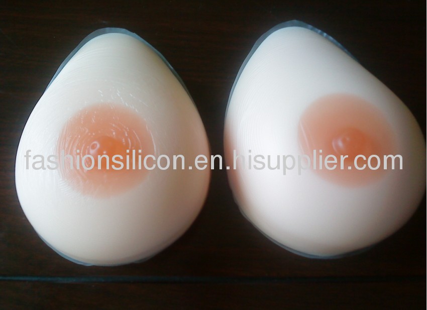 Sexy fake women breasts