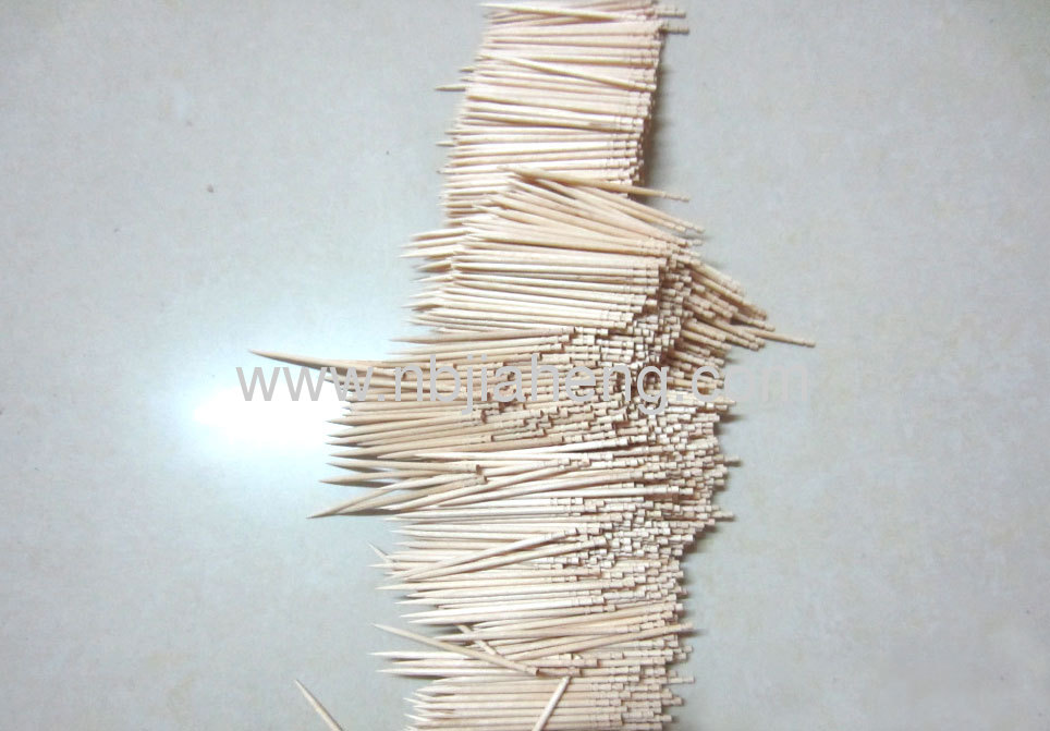 Disposable natural bamboo toothpick in individual paper wrapper