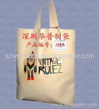 Foldable cotton bag with integrated pocket