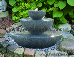 three tier stone fountain