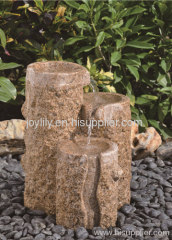 Three pillar stone fountain