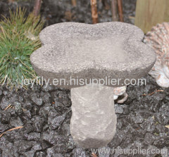 stone carving birdbath