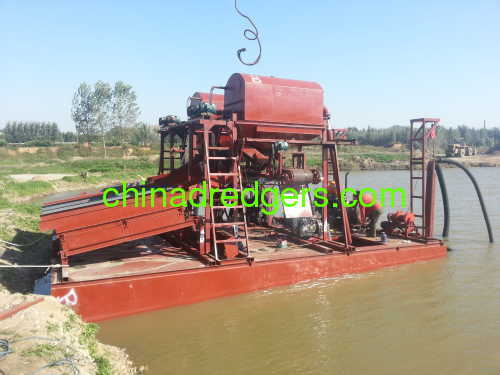 gold suction machine in river sand