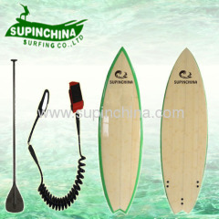 green rail bamboo surf board