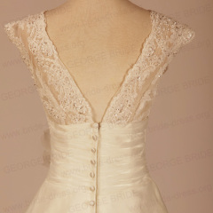 A Line beaded Alencon Lace Wedding Gown With Cap Sleeves