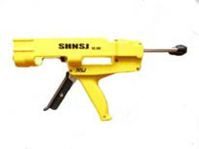 Coaxial caulking gun