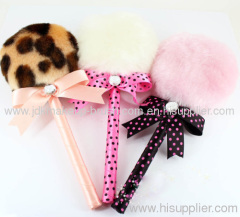 Lollipop powder puff with handle