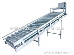 lifter and conveyor for fruit and vegetable juice processing