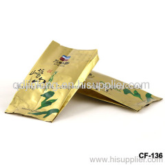 golden color tea bag