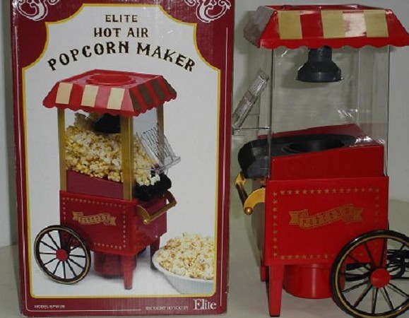 Old fashioned hot air popcorn maker with cart