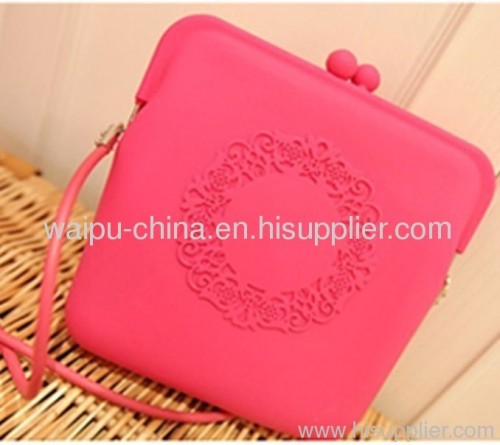 Pink silicone handbag with embossed logo