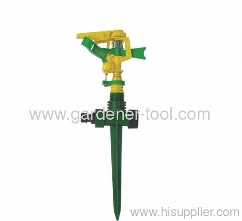 garden lawn sprinkler with plastic spike and connector.