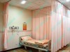 Hospital Ward Using Ceiling Mounted Patients' Bed Curtains and Rails