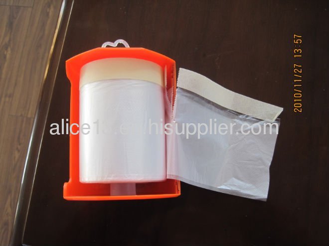 Taped plastic drop film with dispenser