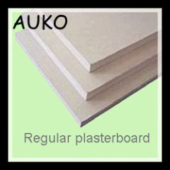 Perforated gypsum plasterboard manufacture