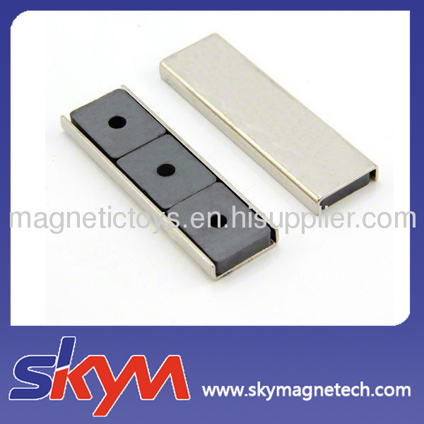 Ferrite channel magnet with hole