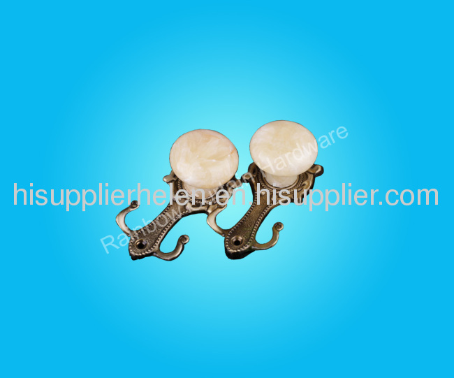 Marble plated metal curtain hook