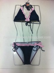 bikinis with laces along inner cups and waistband