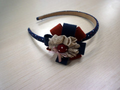 beautiful headbands with a flower and many dots