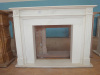 simple white marble fireplace mantel