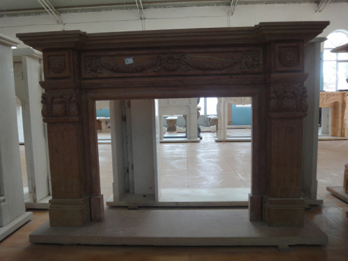 Yellow handcarved stone mantelpiece